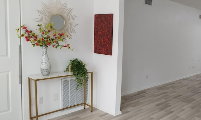 corridor featuring light hardwood / wood-style flooring