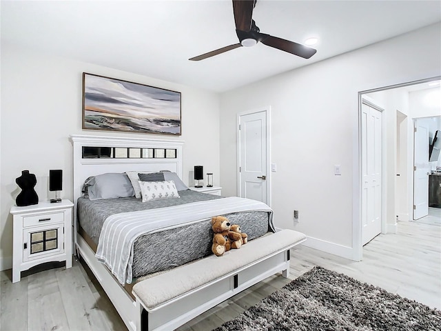 bedroom featuring wood-type flooring and ceiling fan