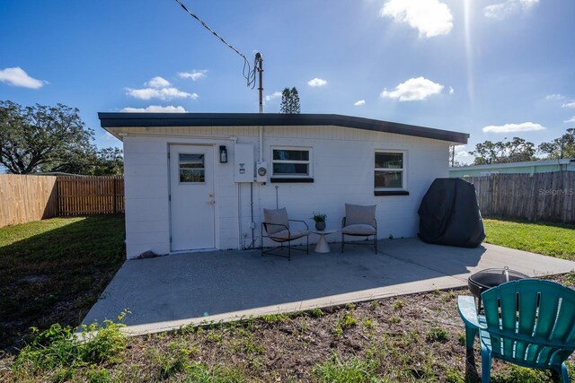 rear view of house with a patio