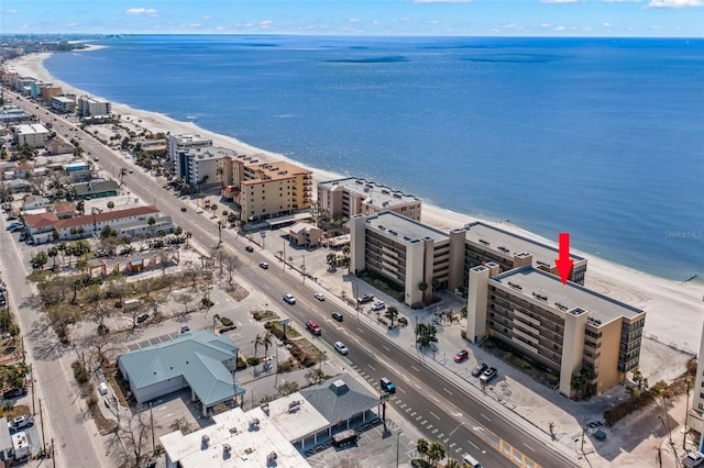 bird's eye view featuring a beach view and a water view