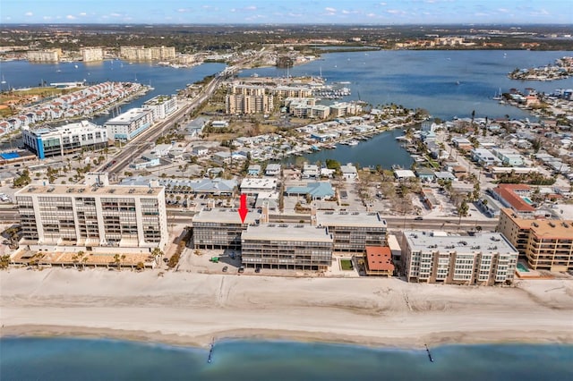 aerial view with a beach view and a water view