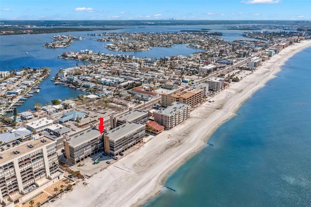 aerial view featuring a view of the beach and a water view