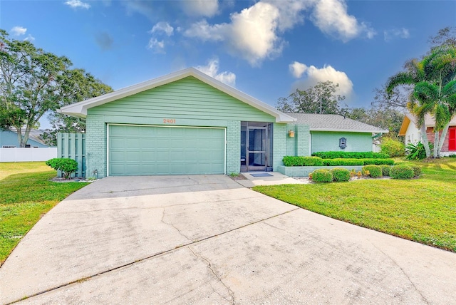 ranch-style house with a front lawn and a garage