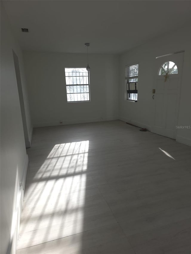 3102 W Leroy St Unit A, Tampa, FL 33607 - empty room with healthy amount of natural light