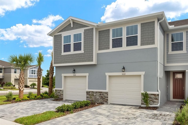 view of front of property with a garage