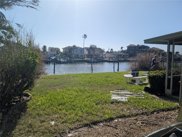 view of yard with a water view