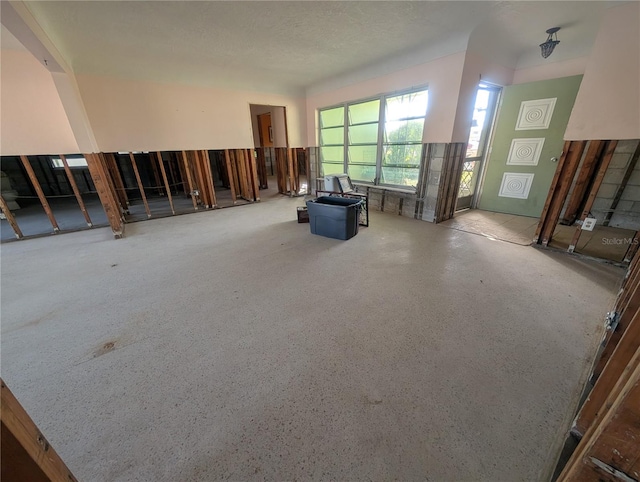 interior space featuring a textured ceiling