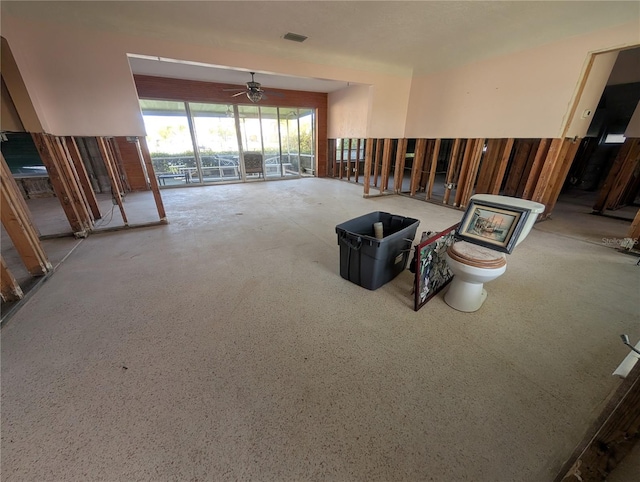 living room with ceiling fan