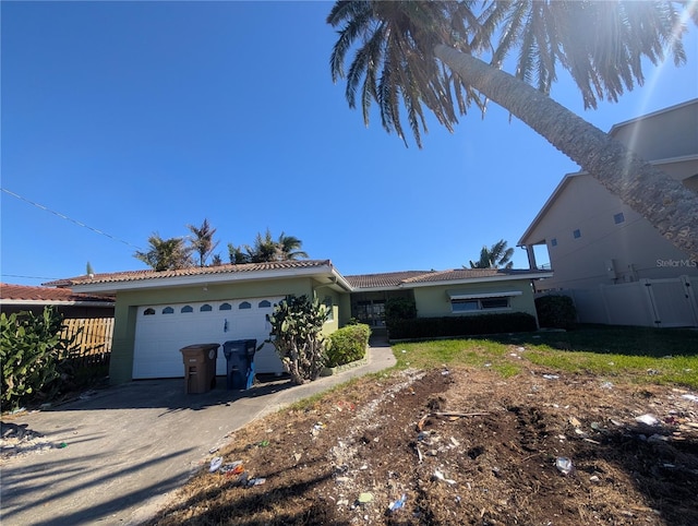 view of front of property with a garage