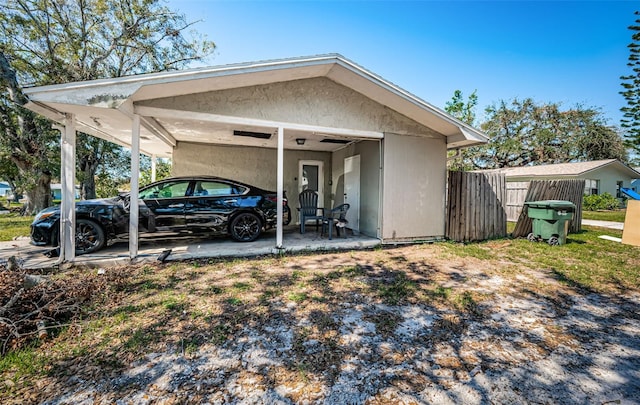 view of front facade with a carport