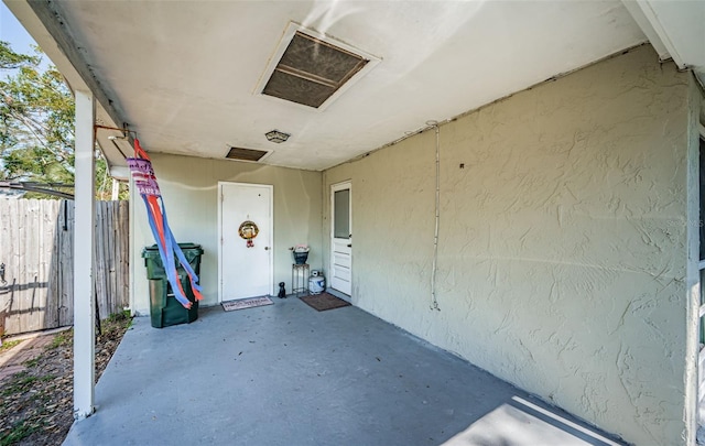 doorway to property featuring a patio