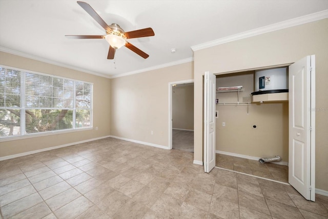 unfurnished bedroom featuring a closet, ceiling fan, and crown molding