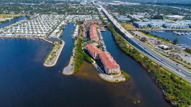 birds eye view of property featuring a water view