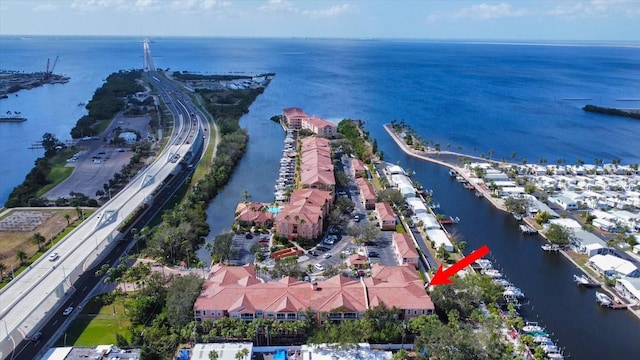 birds eye view of property featuring a water view