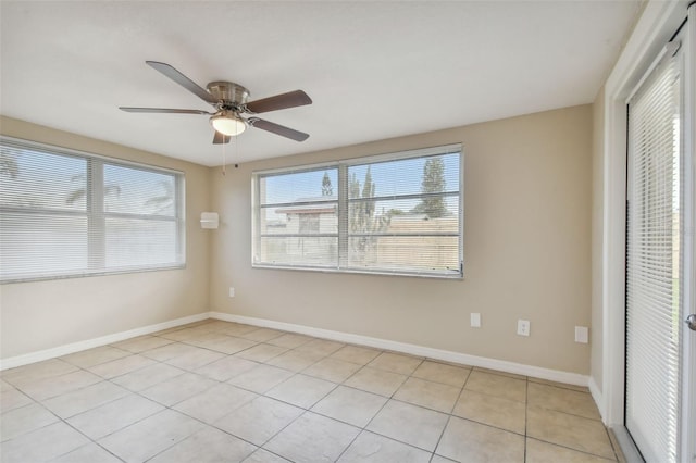 unfurnished bedroom with light tile patterned floors and ceiling fan