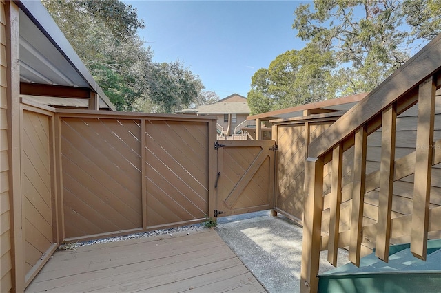 1106 Lennox Rd W, W, Palm Harbor, FL 34683 - deck with a gate and fence