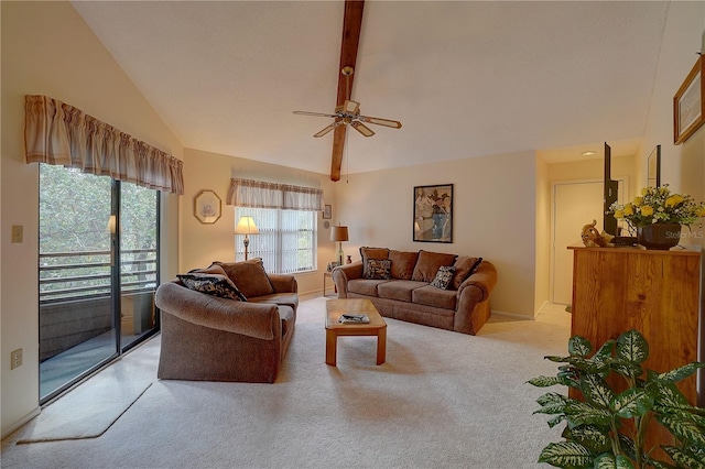 carpeted living room with beam ceiling, high vaulted ceiling, and ceiling fan