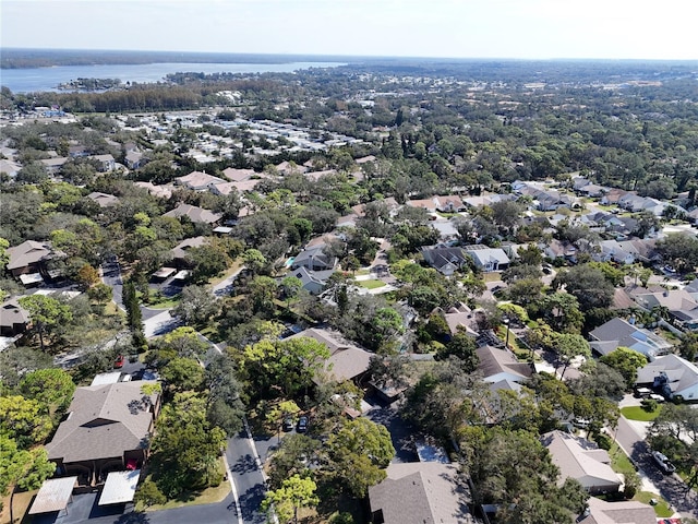 1106 Lennox Rd W, W, Palm Harbor, FL 34683 - aerial view of property and surrounding area with nearby suburban area and a large body of water
