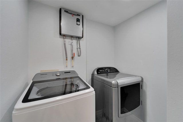 washroom featuring washer and dryer