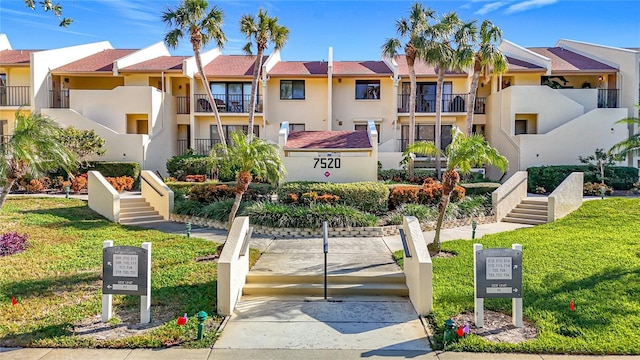 exterior space featuring a residential view and stairway