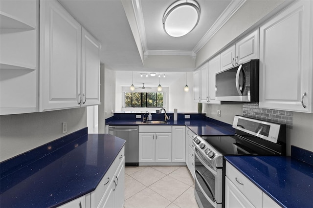 kitchen featuring sink, light tile patterned flooring, stainless steel appliances, white cabinets, and ornamental molding