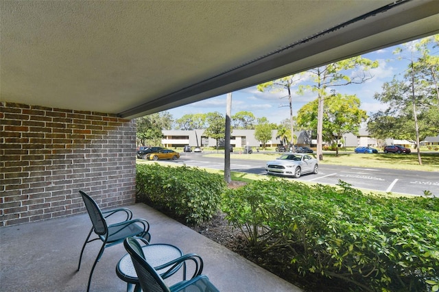 36750 US Highway 19 N Unit 09110, Palm Harbor, FL 34684 - view of patio / terrace with a residential view