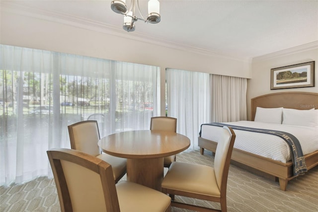 36750 US Highway 19 N Unit 09110, Palm Harbor, FL 34684 - bedroom featuring an inviting chandelier, ornamental molding, and carpet
