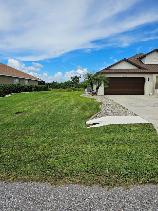 view of yard featuring a garage