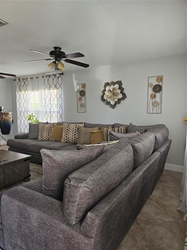 living room with ceiling fan