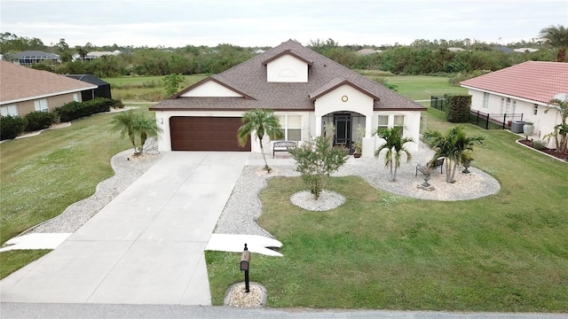 view of front of home featuring central AC, a garage, and a front lawn