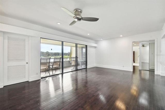 unfurnished living room with dark wood-type flooring, a ceiling fan, baseboards, and recessed lighting