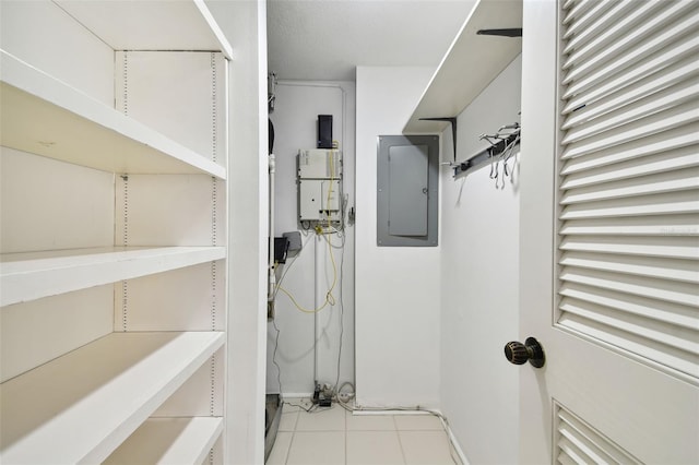 interior space featuring tile patterned floors and electric panel