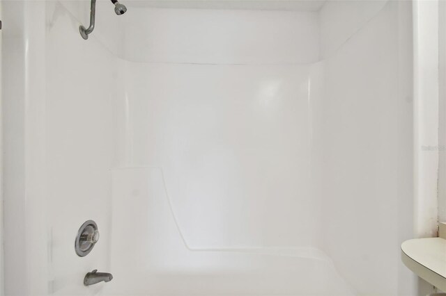 bathroom featuring shower / washtub combination