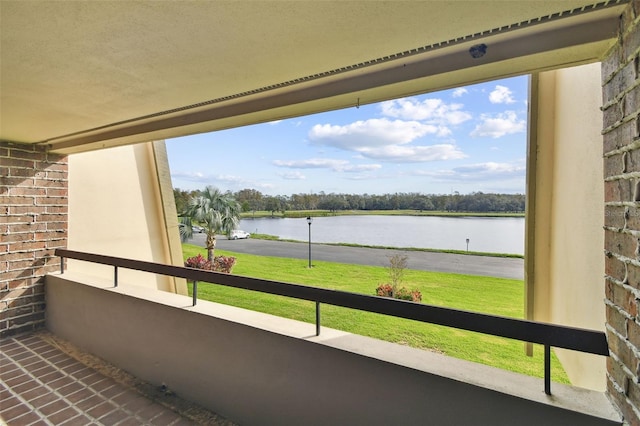 balcony featuring a water view