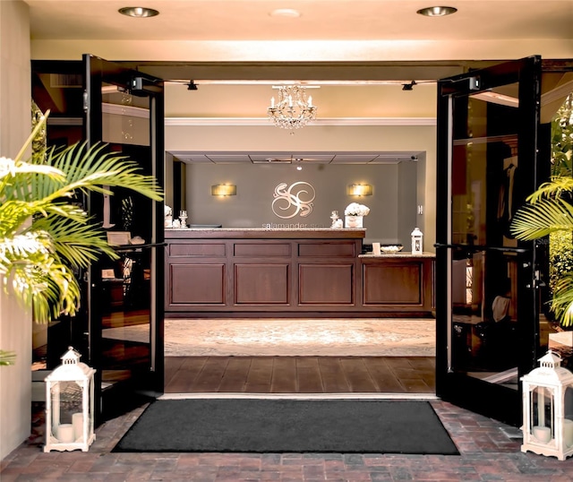 welcome area with a chandelier
