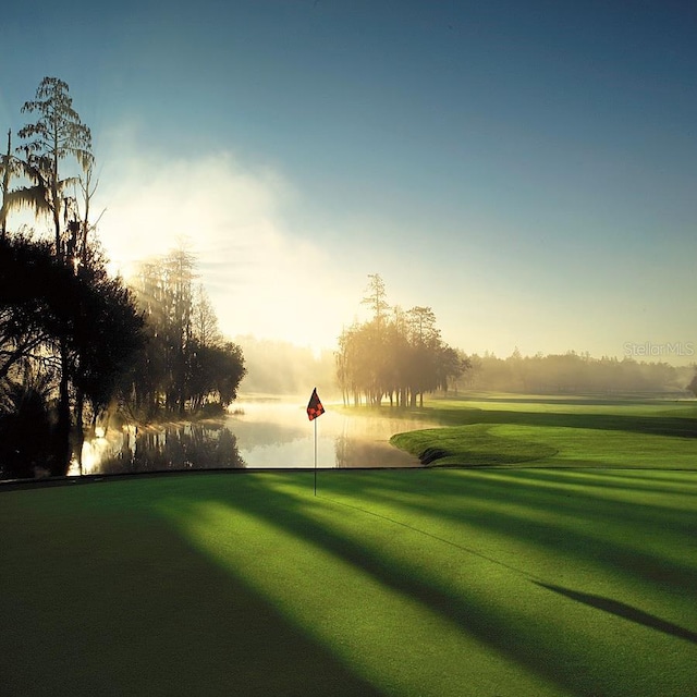 view of property's community with view of golf course