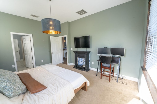 bedroom with light carpet