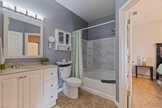 full bathroom featuring tile patterned floors, shower / bath combo, toilet, vanity, and a textured ceiling