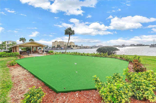 surrounding community featuring a gazebo and a water view