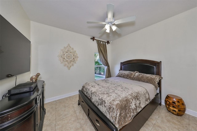 bedroom with light tile patterned floors and ceiling fan