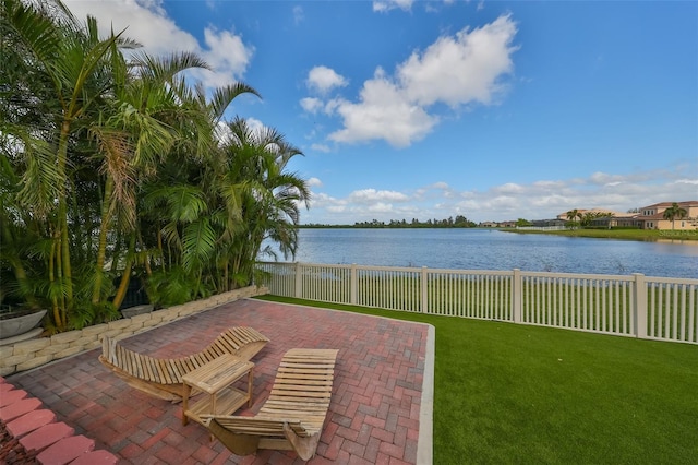 view of patio / terrace with a water view