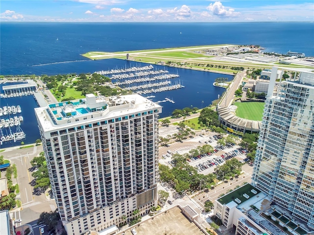 birds eye view of property with a water view