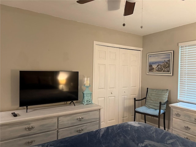 bedroom with a closet and ceiling fan