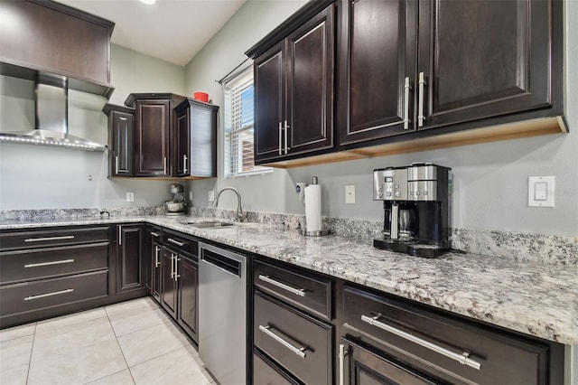 kitchen featuring light stone countertops, sink, light tile patterned flooring, dark brown cabinets, and stainless steel dishwasher