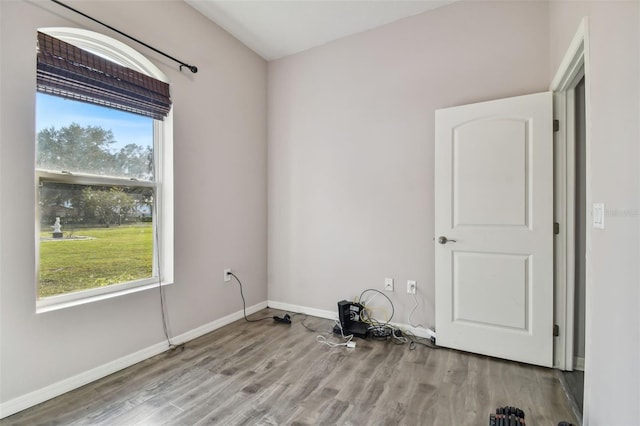 spare room featuring light wood-type flooring