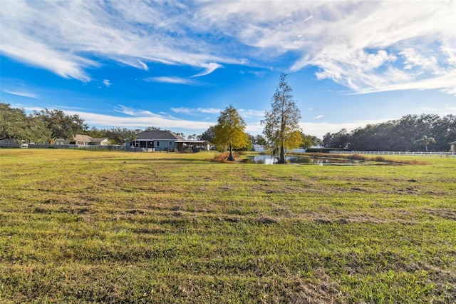 view of yard with a water view