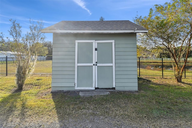 view of outdoor structure with a yard