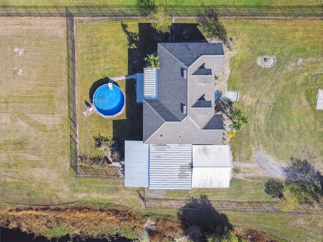 birds eye view of property featuring a rural view