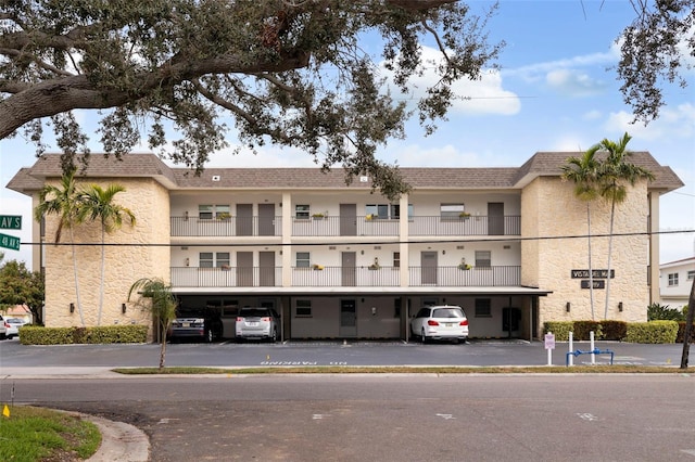 view of building exterior with a carport