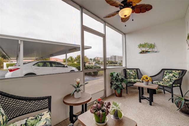 sunroom / solarium with ceiling fan and plenty of natural light